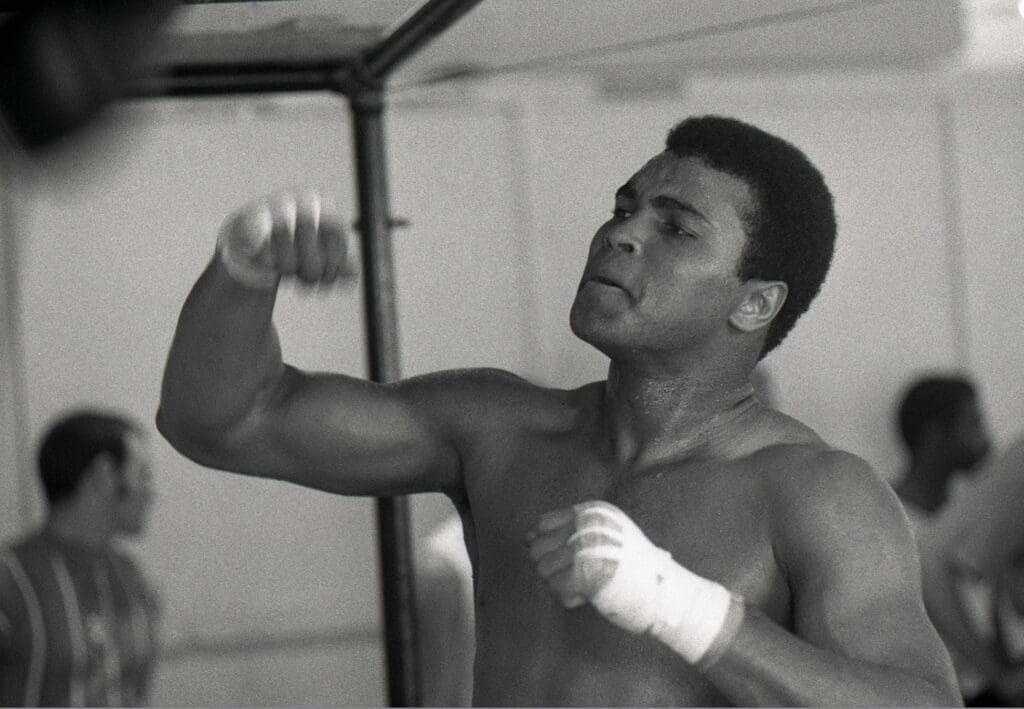 Feb 24, 1971; Miami Beach, FL, USA: FILE PHOTO; Muhammad Ali trains on the fast bag at the 5th Street Gym in Miami Beach during his training for his world heavyweight title bout with Joe Frazier (not pictured). Mandatory Credit: Larry Spitzer/The Courier-Journal-USA TODAY Sports