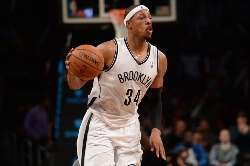 Nov 27, 2013; Brooklyn, NY, USA; Brooklyn Nets small forward Paul Pierce (34) dribbles against the Los Angeles Lakers at Barclays Center. The Lakers won 99-94
