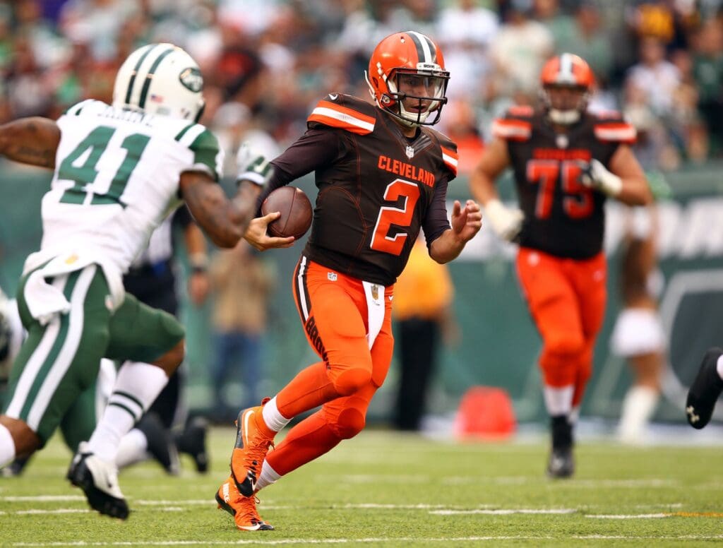 Sep 13, 2015; East Rutherford, NJ, USA; Cleveland Browns quarterback Johnny Manziel (2) runs with the ball against the New York Jets during the second half at MetLife Stadium.
