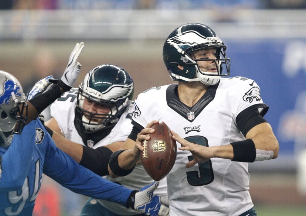 Nov 26, 2015; Detroit, MI, USA; Philadelphia Eagles quarterback Mark Sanchez (3) looks for an open man against the Detroit Lions during the third quarter of a NFL game on Thanksgiving at Ford Field. Lions win 45-14