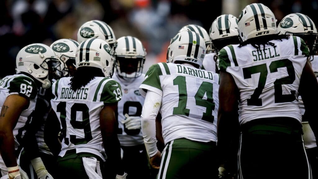 Oct 28, 2018; Chicago, IL, USA; New York Jets quarterback Sam Darnold (14) chats with his team during the second half against the Chicago Bears at Soldier Field
