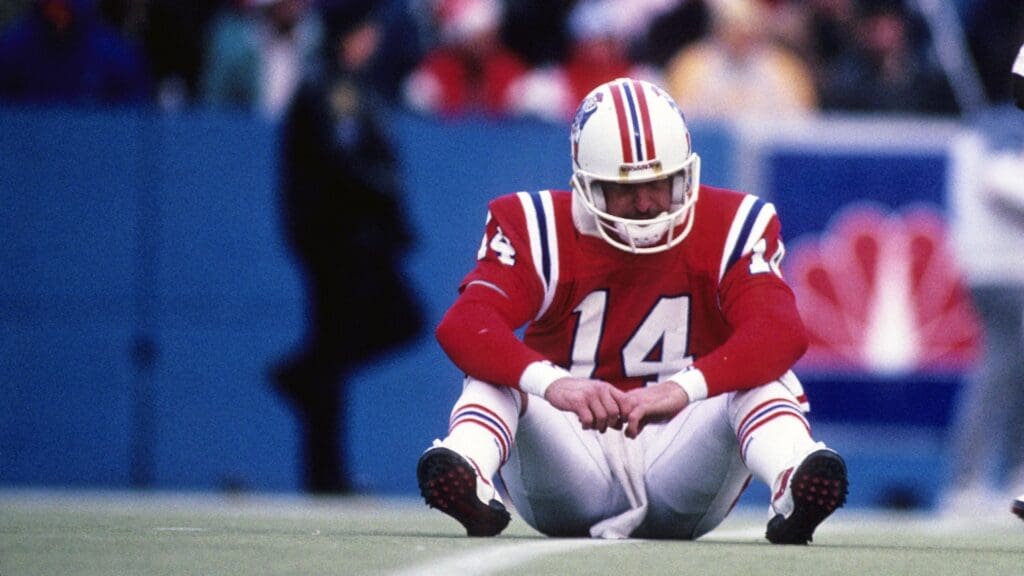 Nov 19, 1989; Foxboro, MA, USA; New England Patriots quarterback Steve Grogan (14) in action against the Buffalo Bills at Foxboro Stadium.
