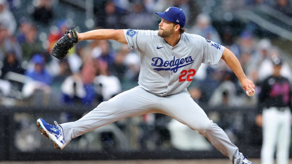 May 23, 2025; New York City, New York, USA; Los Angeles Dodgers starting pitcher Clayton Kershaw (22) pitches against the New York Mets during the first inning at Citi Field.