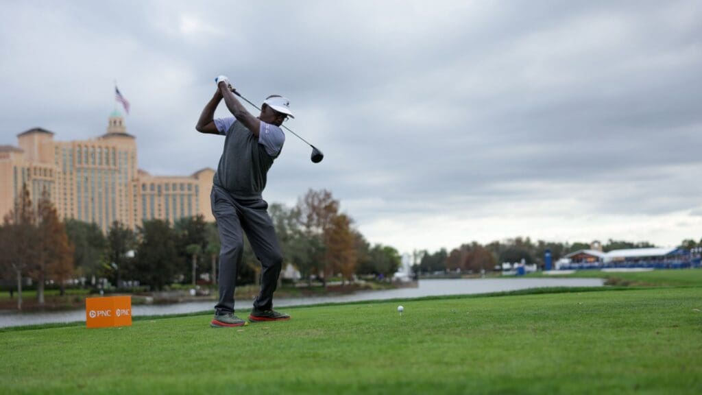 Dec 22, 2024; Orlando, Florida, [USA]; Vijay Singh tees off on the 18th hole during the PNC Championship at The Ritz-Carlton Golf Club.