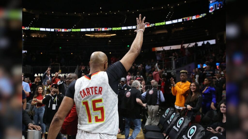 Mar 11, 2020; Atlanta, Georgia, USA; Atlanta Hawks guard Vince Carter (15) waves to fans after an overtime loss to the New York Knicks at State Farm Arena.
