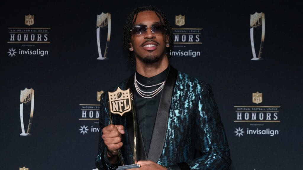 Feb 6, 2025; New Orleans, LA, USA; Washington Commanders quarterback Jayden Daniels poses with the Offensive Rookie of the Year award during Super Bowl LIX NFL Honors at Saenger Theatre. 