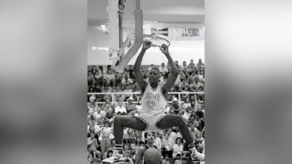 West Oso's Julio Gonzalez could only look up to San Antonio Cole's Shaquille O'Neal (33) during the Region IV-3A tournament on March 3, 1989 at Steinke Event Center at Texas A&I University in Kingsville. San Antonio Cole won 80-53.