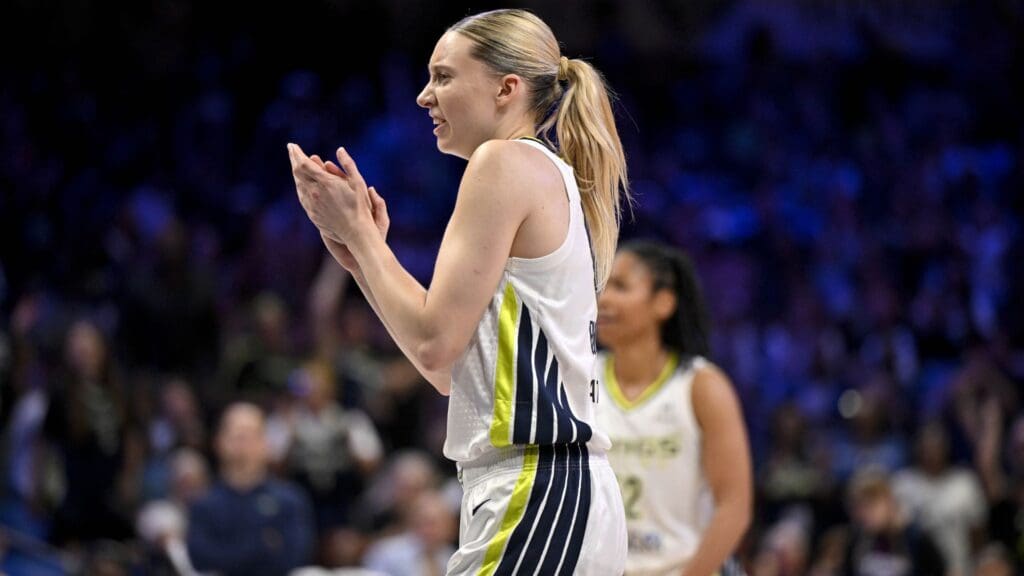 May 19, 2025; Arlington, Texas, USA; Dallas Wings guard Paige Bueckers (5) celebrates during the first half against the Seattle Storm at College Park Center