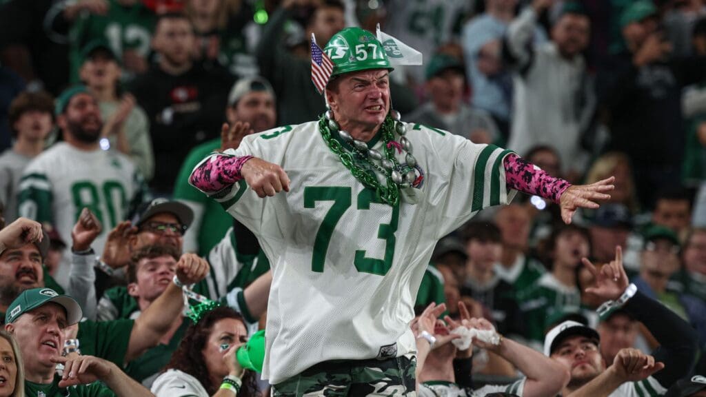 Oct 1, 2023; East Rutherford, New Jersey, USA; A New York Jets fan cheers during the first half against the Kansas City Chiefs at MetLife Stadium