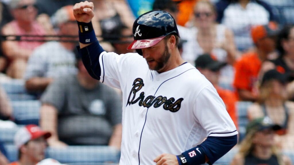 May 30, 2016; Atlanta, GA, USA; Atlanta Braves catcher A.J. Pierzynski (15) celebrates while scoring a run against the San Francisco Giants in the second inning at Turner Field.