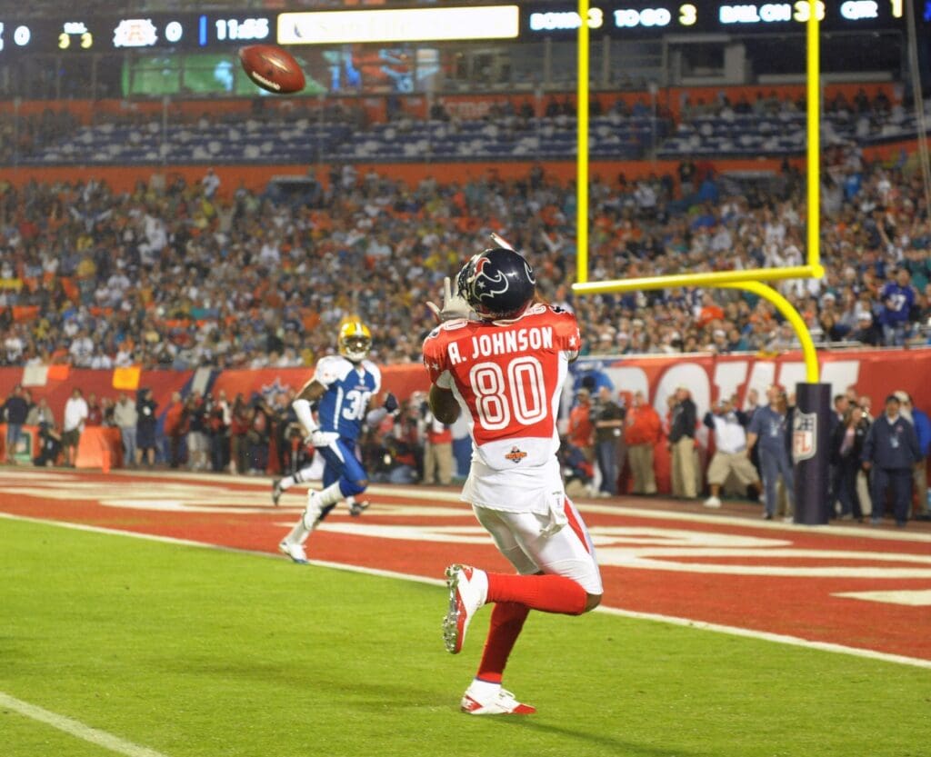Jan 31, 2010; Miami, FL, USA; AFC receiver Andre Johnson of the Houston Texans (80) catches a 33-yard touchdown pass in the first quarter of the 2010 Pro Bowl at Sun Life Stadium. The AFC defeated the NFC 41-34.