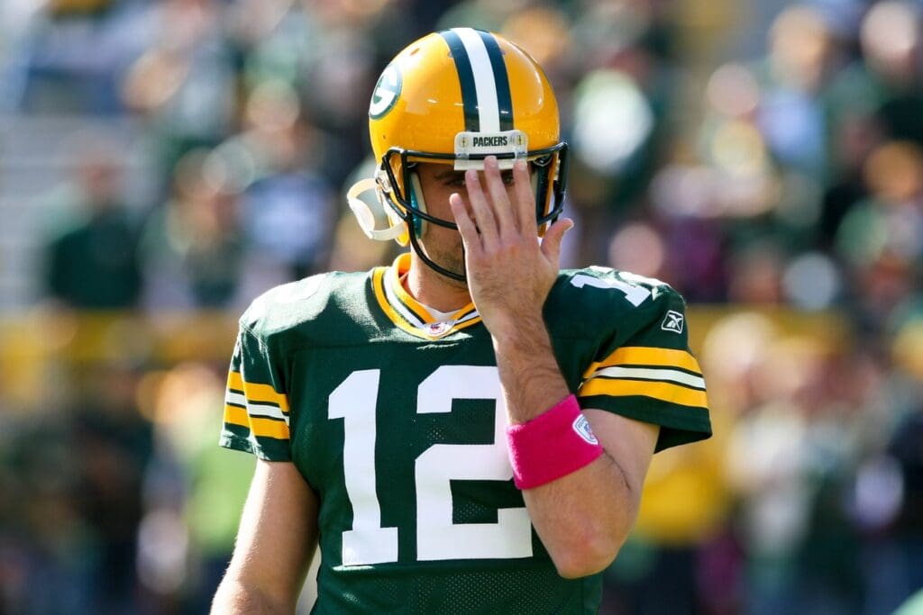 Oct 2, 2011; Green Bay, WI, USA; Green Bay Packers quarterback Aaron Rodgers (12) against the Denver Broncos at Lambeau Field. The Packers defeated the Broncos 49-23.