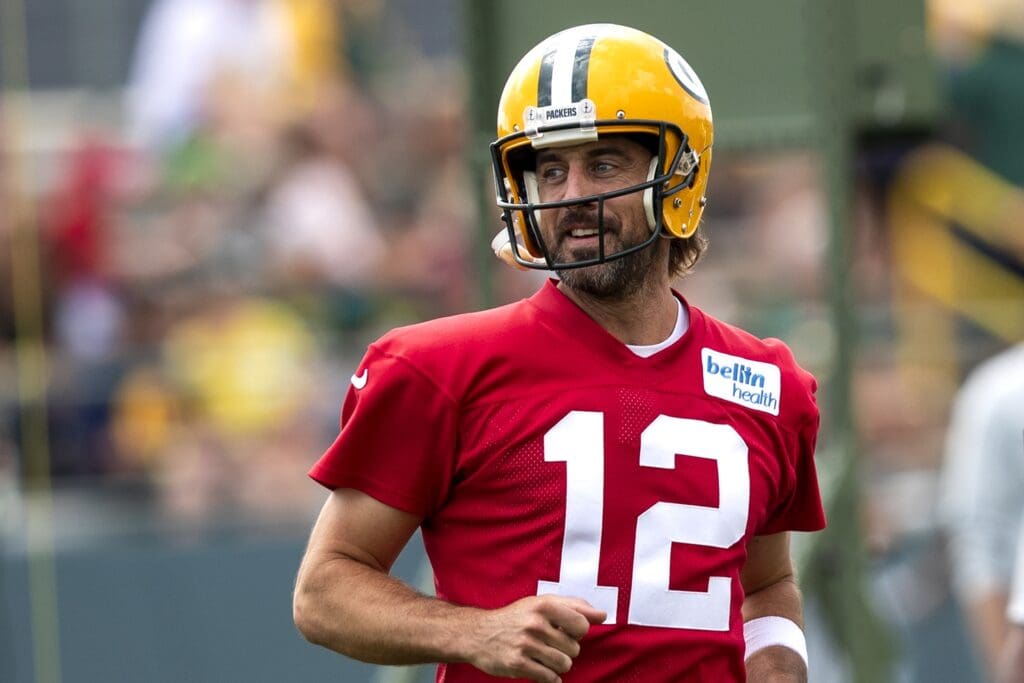 Aug 2, 2021; Green Bay, Wisconsin, USA; Green Bay Packers quarterback Aaron Rodgers (12) participates in training camp at Ray Nitschke Field.
