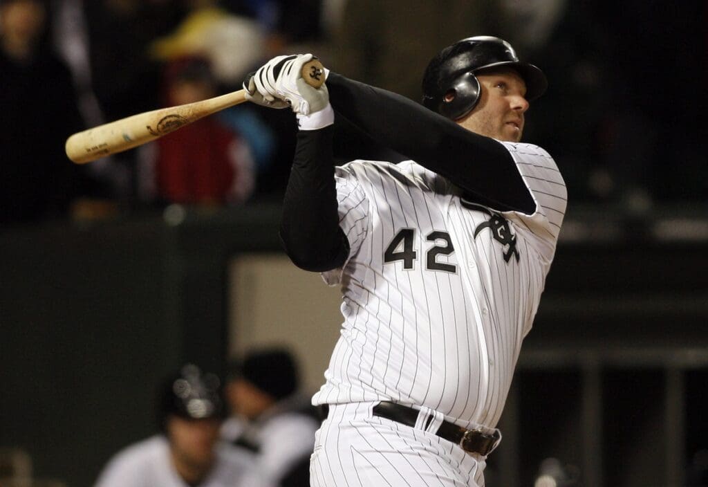 Apr 15, 2011; Chicago, IL, USA; Chicago White Sox designated hitter Adam Dunn hits a two-run home run during the sixth inning against the Los Angeles Angels at US Cellular Field.