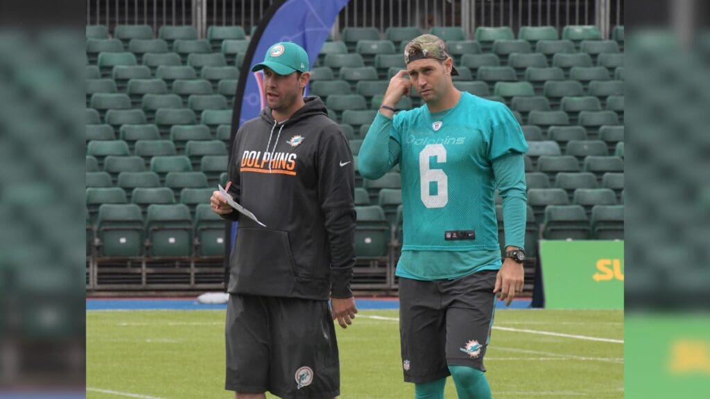 Sep 29, 2017; London, United Kingdom; Miami Dolphins head coach Adam Gase (left) talks with quarterback Jay Cutler (6) during practice at Allianz Park.