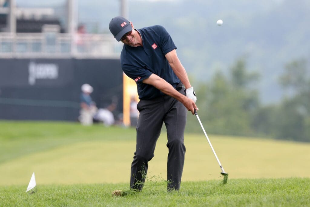 Jun 13, 2025; Oakmont, Pennsylvania, USA; Adam Scott plays his shot in the rough on the 17th hole during the second round of the U.S. Open golf tournament.