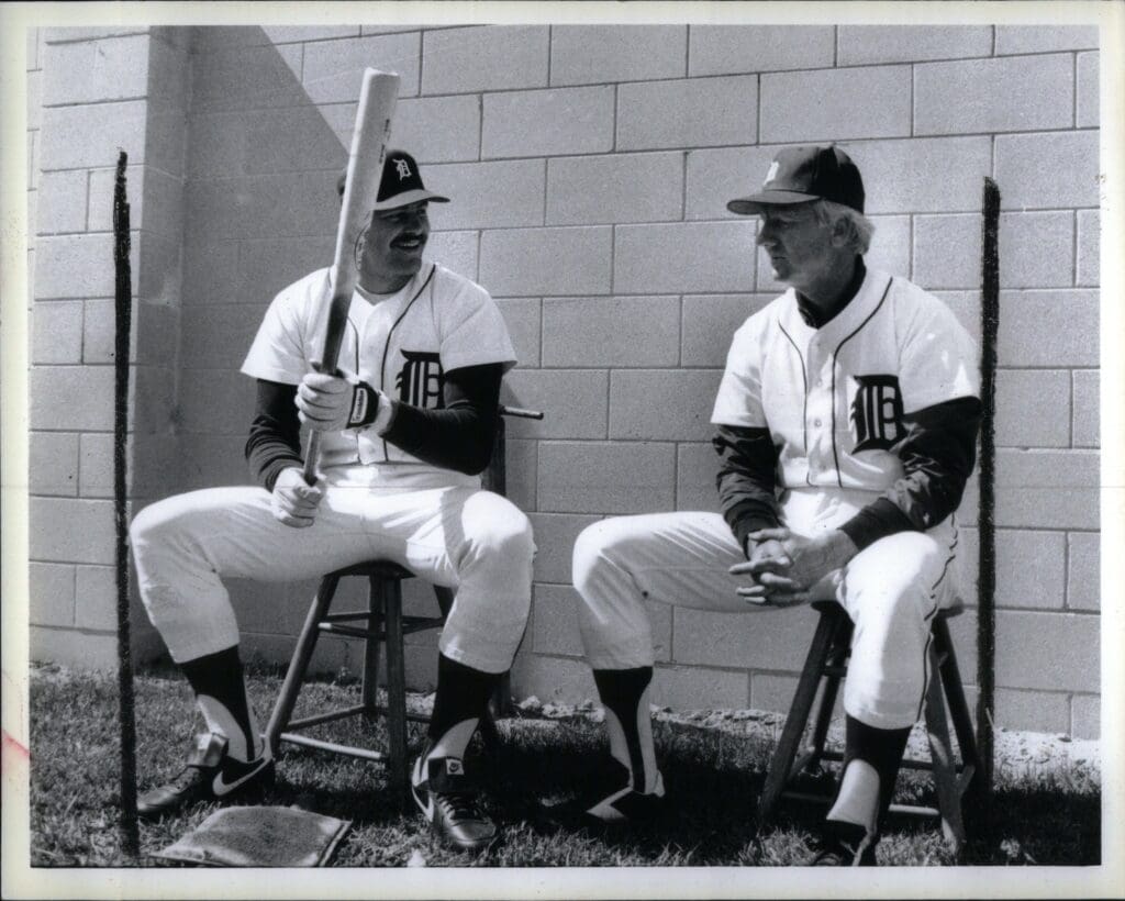 Kirk Gibson talks shop with a top Tigers hitter of the past, Al Kaline, during spring training in March 1986. Gibson, who had a contentious contract dispute with the Tigers during the offseason, would go on to hit 28 homers in 1986. Kaline Gibby