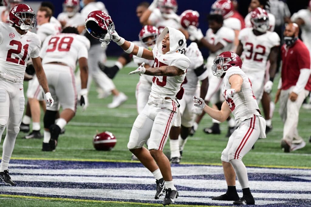 Dec 19, 2020; Atlanta, Georgia, USA; The Alabama Crimson Tide celebrate after beating the Florida Gators in the SEC Championship at Mercedes-Benz Stadium.
