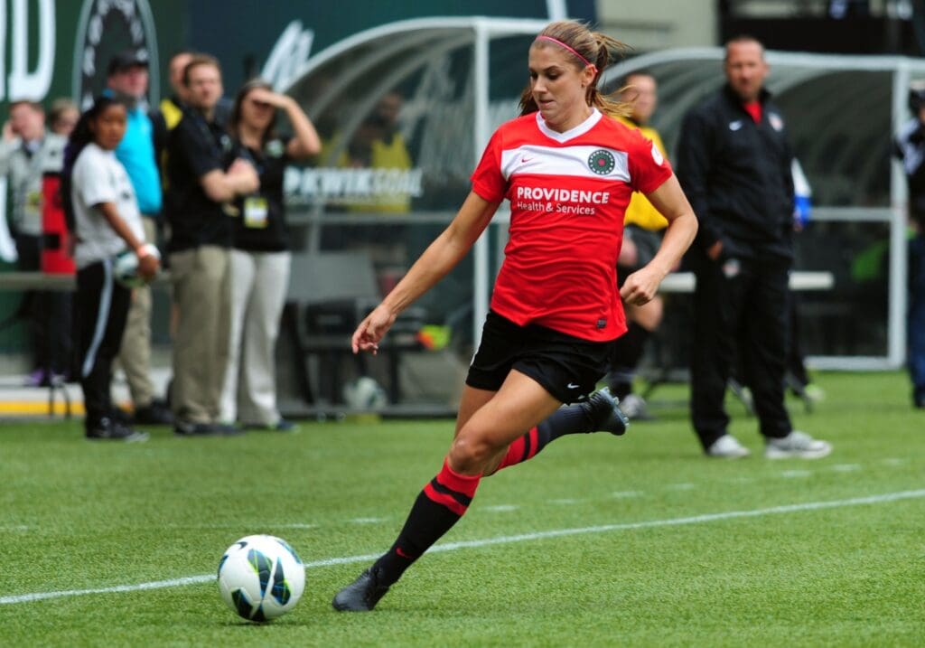 May 19, 2013; Portland, OR, USA; Portland Thorns forward Alex Morgan (13) brings the ball up the field during the first half of the game against the Washington Spirit at Jeld-Wen Field.