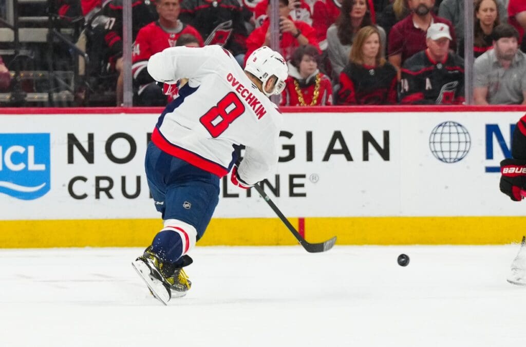 May 12, 2025; Raleigh, North Carolina, USA; Washington Capitals left wing Alex Ovechkin (8) scores a goal on his shot against the Carolina Hurricanes during the third period in game four of the second round of the 2025 Stanley Cup Playoffs at Lenovo Center.