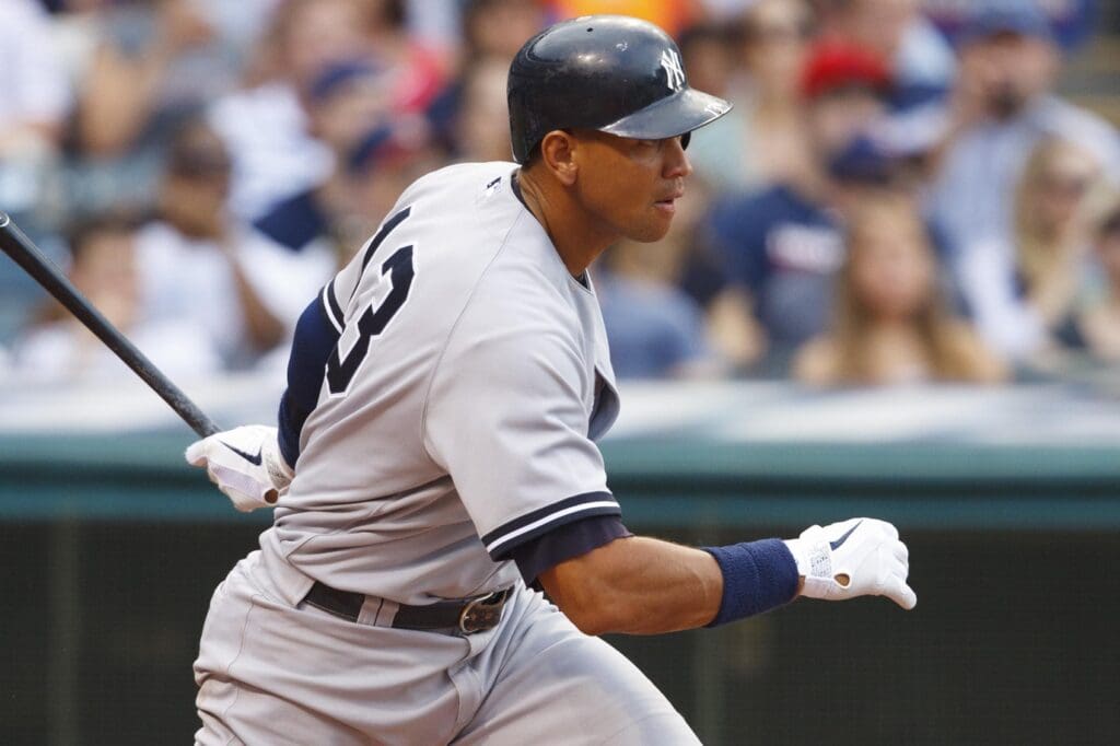 July 6, 2011; Cleveland, OH, USA; New York Yankees third baseman Alex Rodriguez (13) hits a single during the second inning against the Cleveland Indians at Progressive Field.