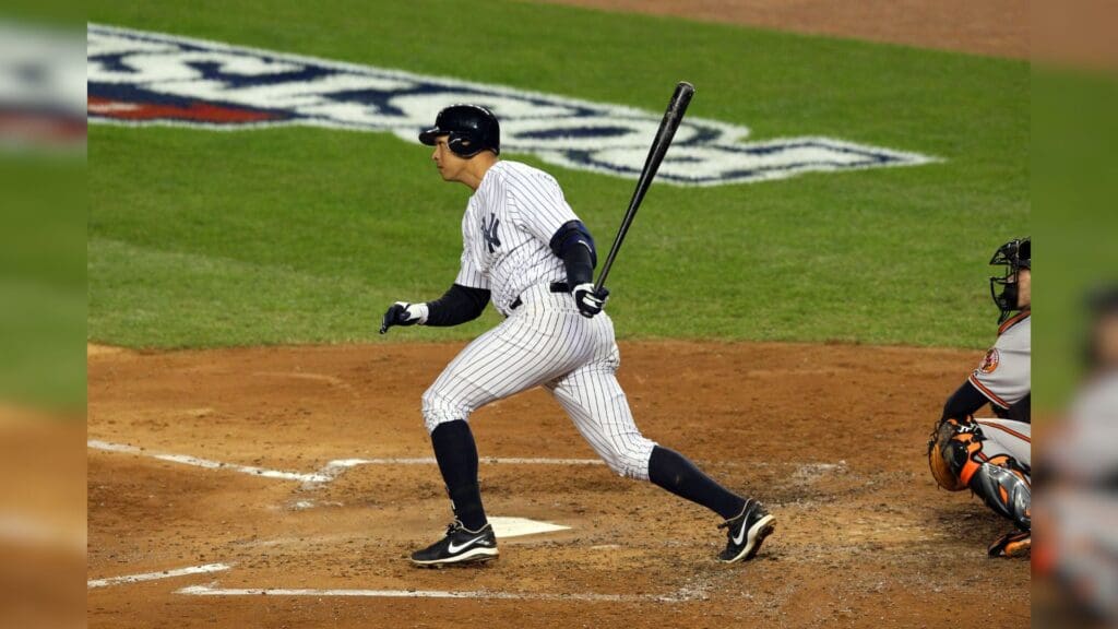 October 11, 2012; Bronx, NY, USA; New York Yankees third baseman Alex Rodriguez (13) hits a single during the fourth inning of game four of the ALDS against the Baltimore Orioles at Yankee Stadium.