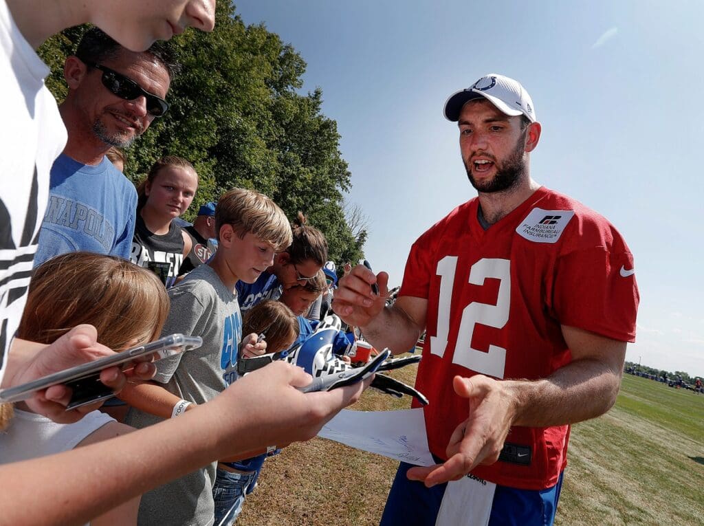 Indianapolis Colts quarterback Andrew Luck signs autographs for fans following their first day of their preseason training camp at Grand Park in Westfield on Thursday, July 25, 2019. Colts First Day Of Presseason Training Camp