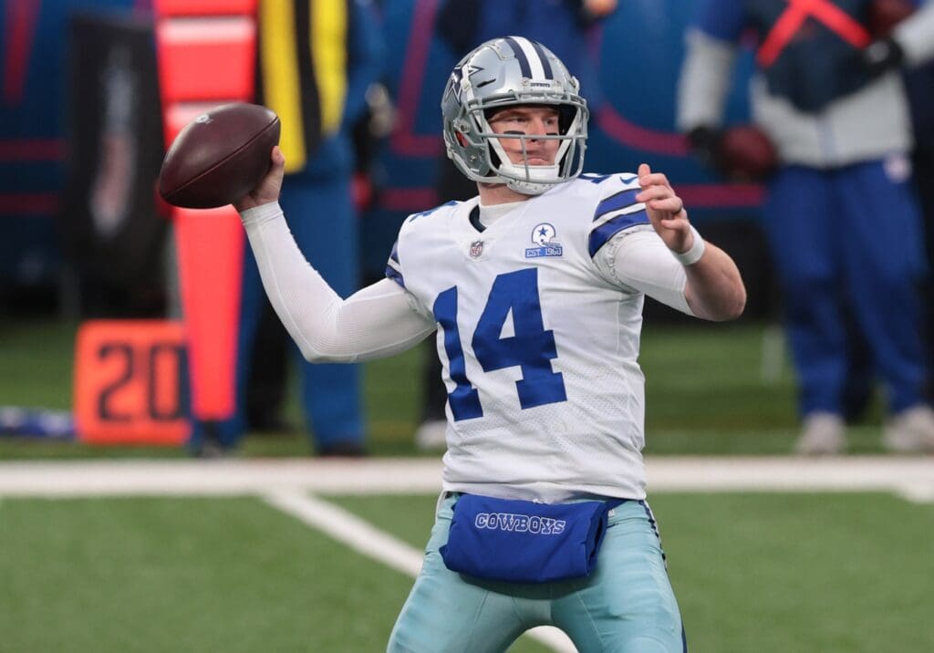 Jan 3, 2021; East Rutherford, NJ, USA; Dallas Cowboys quarterback Andy Dalton (14) throws a pass against the New York Giants in the first half at MetLife Stadium.