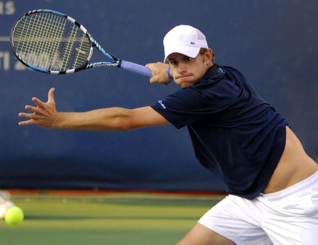 Aug 19, 2006; Cincinnati, OH, USA; Andy Roddick returns a shot in his match with Fernando Gonzalez (not pictured) in the semifinal round of the Western and Southern Financial Masters Open at Lindner Family Tennis Center in Mason, OH.