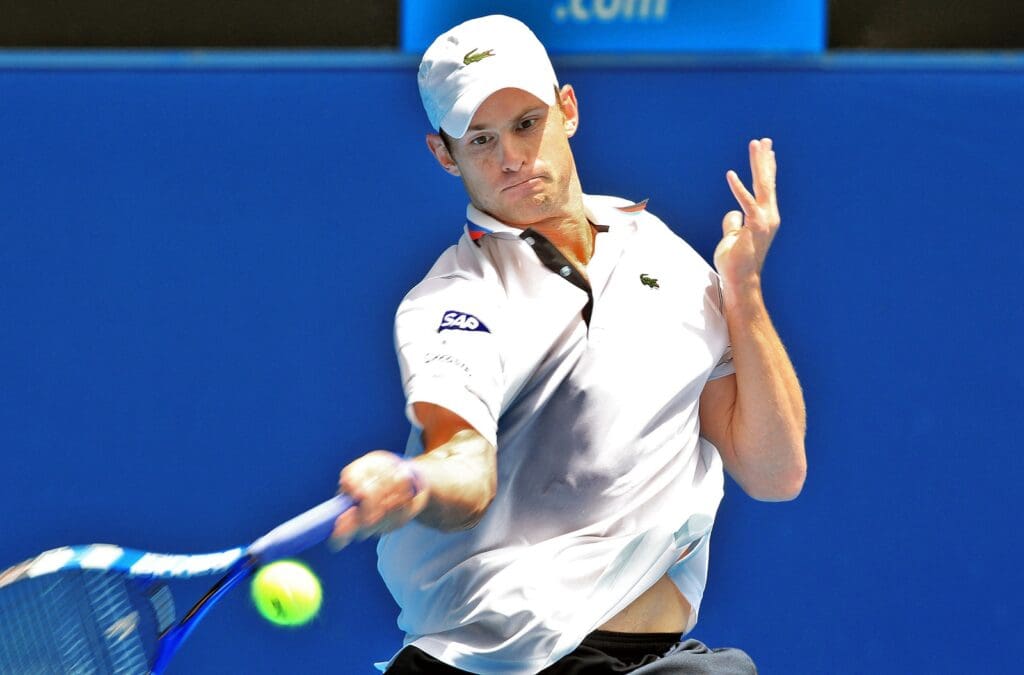Jan 20, 2010; Melbourne, AUSTRALIA; Andy Roddick (USA) returns a shot against Tomaz Bellucci (BRA) on day three of the 2010 Australian Open. Roddick won 6-3, 6-4, 6-4.