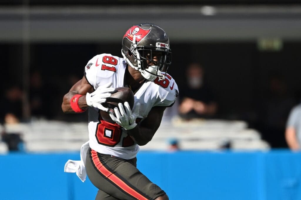 Dec 26, 2021; Charlotte, North Carolina, USA; Tampa Bay Buccaneers wide receiver Antonio Brown (81) catches the ball in the second quarter at Bank of America Stadium.