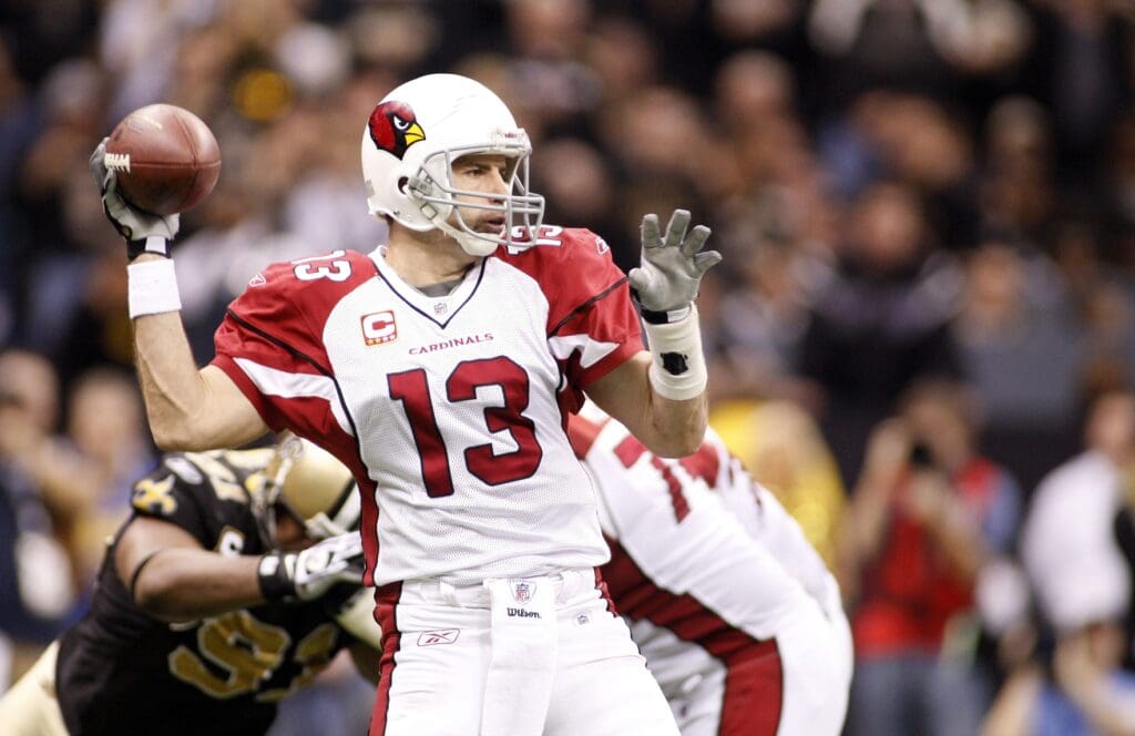 Jan. 16, 2010; New Orleans, LA, USA; Arizona Cardinals quarterback Kurt Warner (13) looks to pass against the New Orleans Saints during 3rd quarter at the Louisiana Superdome. The Saints defeated the Cardinals 45-14