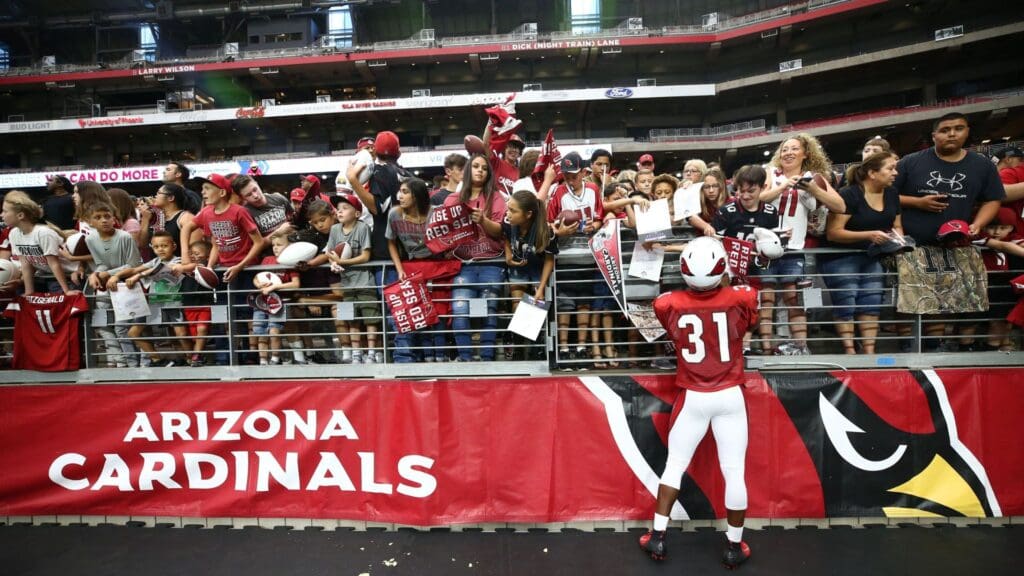 Arizona Cardinals running back David Johnson signs autographs for the fans during the annual Red and White Practice on Aug. 4, 2018 at University of Phoenix Stadium in Glendale, Ariz. Red and White Practice 2018