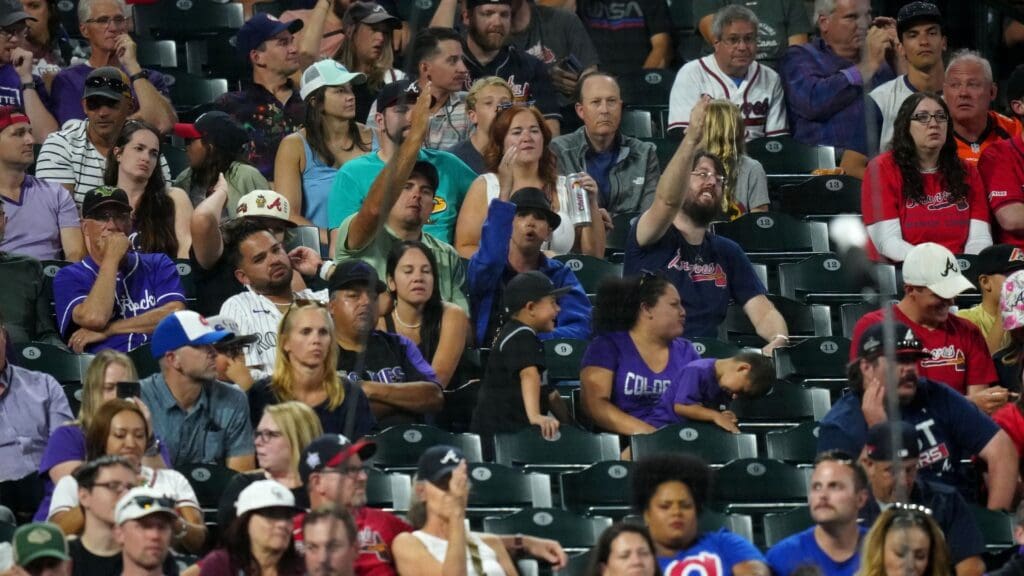 Aug 29, 2023; Denver, Colorado, USA; Atlanta Braves fans do the chop in the ninth inning against the Colorado Rockies at Coors Field.