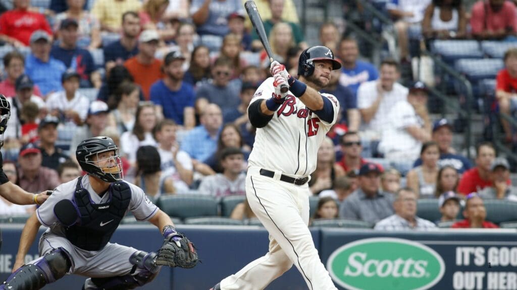Jul 16, 2016; Atlanta, GA, USA; Atlanta Braves catcher A.J. Pierzynski (15) hits a two-run home run against the Colorado Rockies in the second inning at Turner Field.