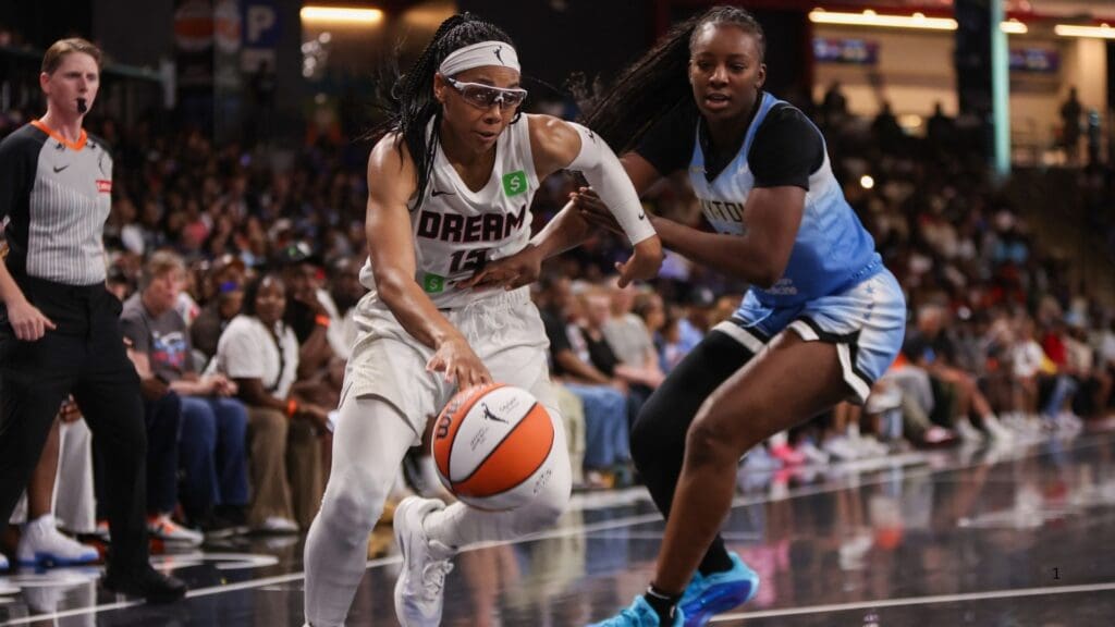 Jun 22, 2025; College Park, Georgia, USA; Atlanta Dream guard Allisha Gray (15) drives on Chicago Sky forward Michaela Onyenwere (12) in the fourth quarter at Gateway Center Arena at College Park.