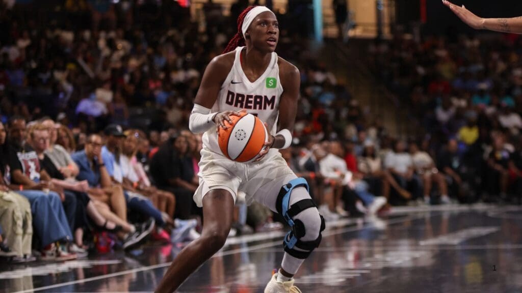 Jun 22, 2025; College Park, Georgia, USA; Atlanta Dream guard Rhyne Howard (10) handles the ball against the Chicago Sky in the third quarter at Gateway Center Arena at College Park.