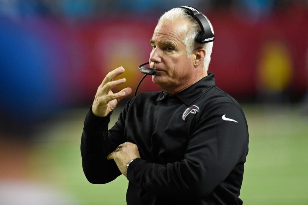 Dec 28, 2014; Atlanta, GA, USA; Atlanta Falcons head coach Mike Smith on the sideline against the Carolina Panthers at the Georgia Dome. The Panthers defeated the Falcons 34-3.