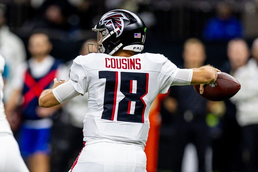 Nov 10, 2024; New Orleans, Louisiana, USA; Atlanta Falcons quarterback Kirk Cousins (18) passes against the New Orleans Saints during the first half at Caesars Superdome.
