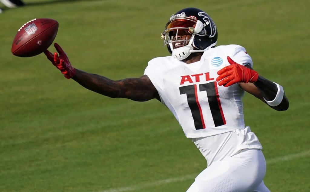 Aug 26, 2020; Flowery Branch, GA, USA; Atlanta Falcons wide receiver Julio Jones (11) catches a ball during an NFL football training camp practice on Wednesday, Aug. 26, 2020, in Flowery Branch, Ga.