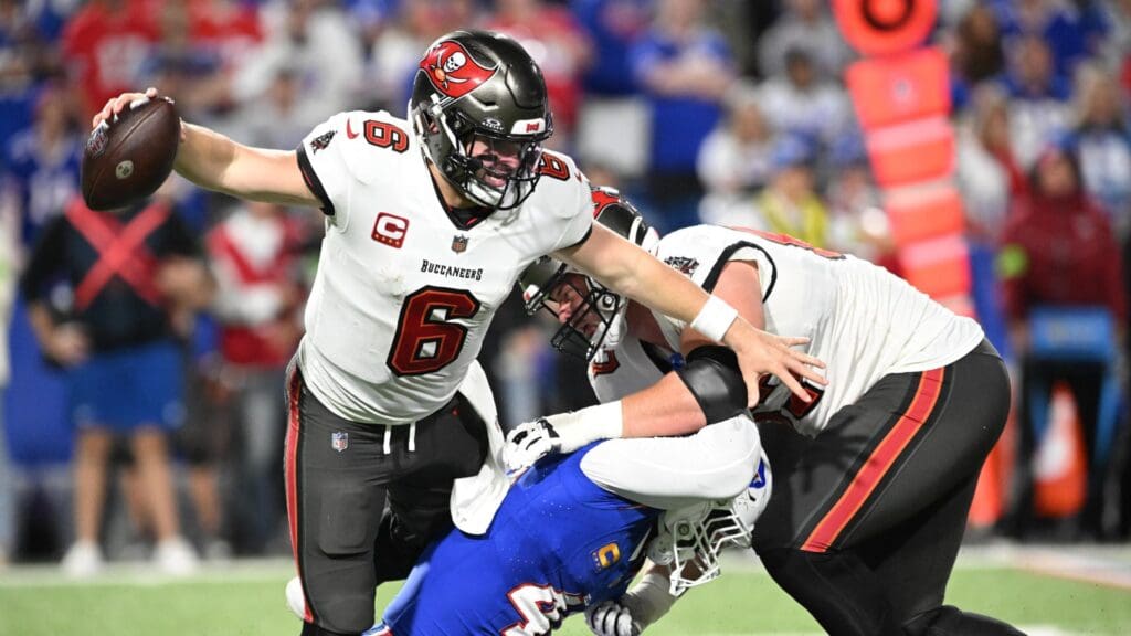 Oct 26, 2023; Orchard Park, New York, USA; Tampa Bay Buccaneers quarterback Baker Mayfield (6) avoids a tackle by Buffalo Bills linebacker Von Miller (40) in the fourth quarter at Highmark Stadium.