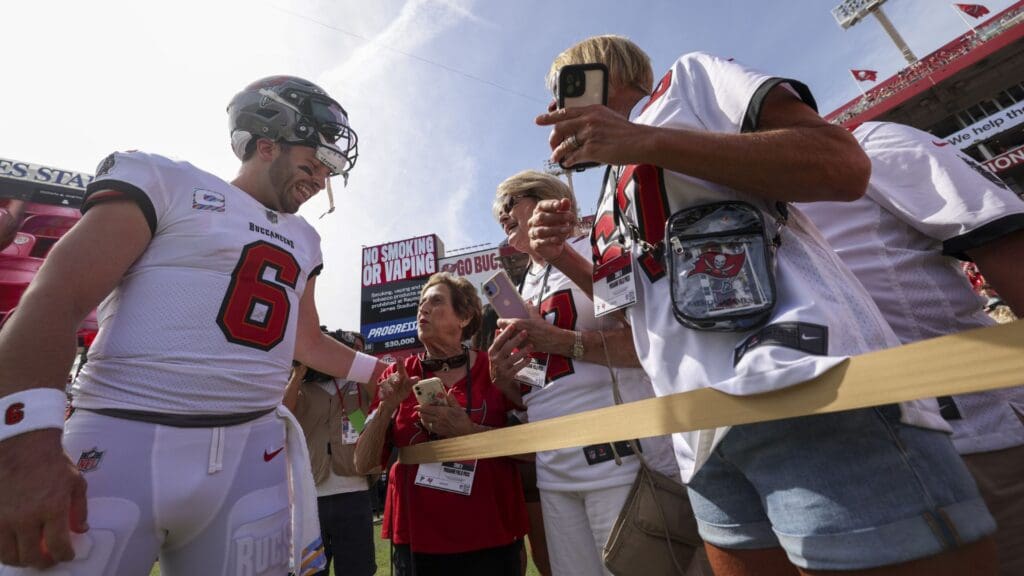 Oct 22, 2023; Tampa, Florida, USA; Tampa Bay Buccaneers quarterback Baker Mayfield (6) talks to fans before a game against the Atlanta Falcons at Raymond James Stadium.