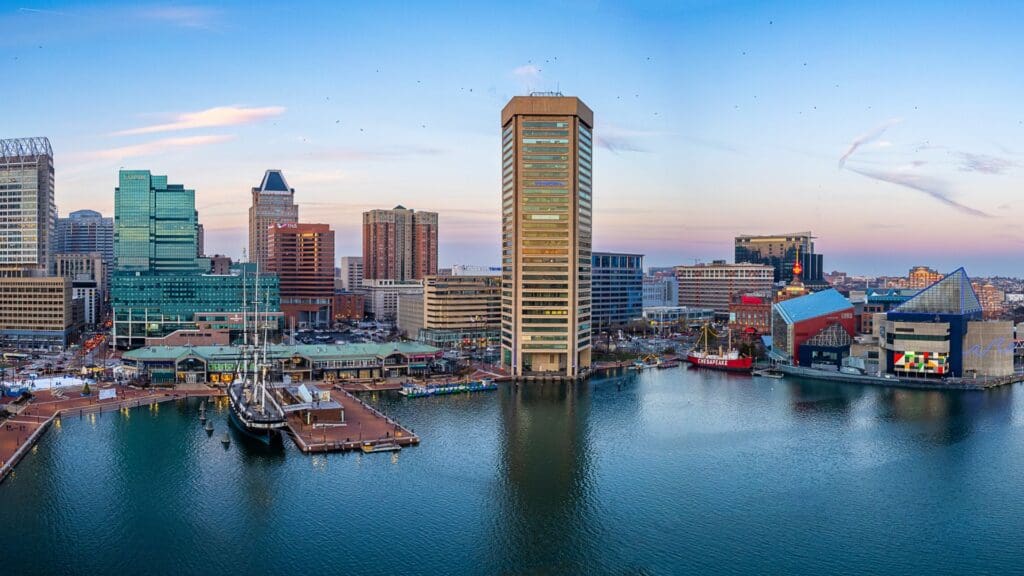 An aerial photograph of Baltimore's Inner Harbor at dusk in December 2022.