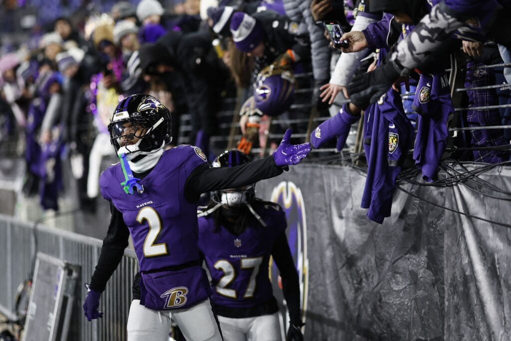 Jan 11, 2025; Baltimore, Maryland, USA; Baltimore Ravens cornerback Nate Wiggins (2) greets fans before warm up in an AFC wild card game against the Pittsburgh Steelers at M&T Bank Stadium.