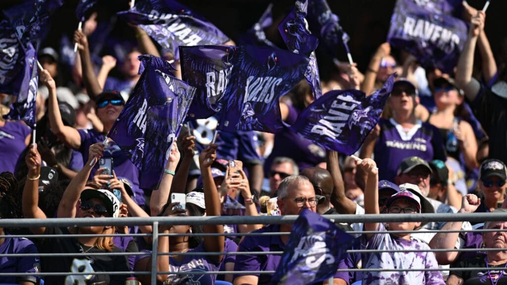 Sep 18, 2022; Baltimore, Maryland, USA; Baltimore Ravens fans wave flags during the gam e against the Miami Dolphins at M&T Bank Stadium