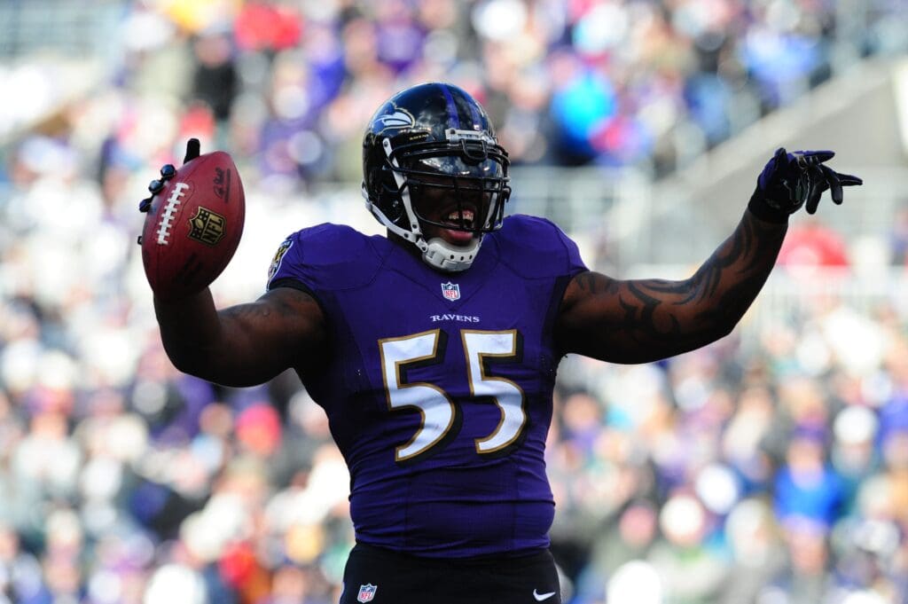 Nov 24, 2013; Baltimore, MD, USA; Baltimore Ravens linebacker Terrell Suggs (55) reacts after recovering a fumble during the game against the New York Jets at M&T Bank Stadium.