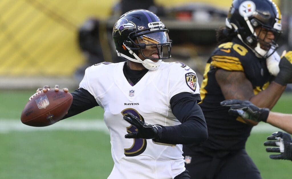 Dec 2, 2020; Pittsburgh, Pennsylvania, USA; Baltimore Ravens quarterback Robert Griffin III (3) passes against the Pittsburgh Steelers during the first quarter at Heinz Field.
