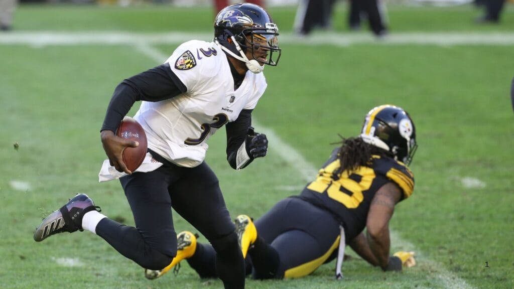 Dec 2, 2020; Pittsburgh, Pennsylvania, USA; Baltimore Ravens quarterback Robert Griffin III (3) scrambles with the ball against the Pittsburgh Steelers during the first quarter at Heinz Field.
