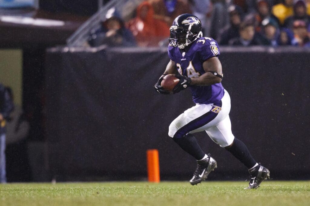Dec 4, 2011; Cleveland, OH, USA; Baltimore Ravens running back Ricky Williams (34) runs the ball against the Cleveland Browns at Cleveland Browns Stadium