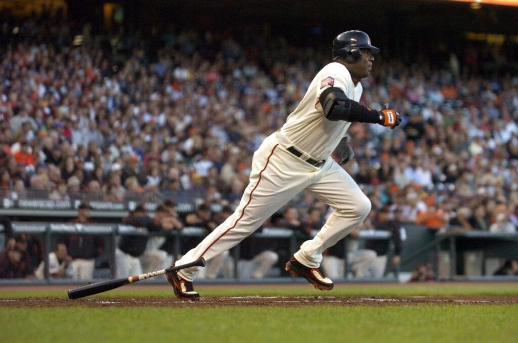 Jul 13, 2007; San Francisco, CA, USA; San Francisco Giants left fielder Barry Bonds (25) grounds the ball for an out during the 1st inning against the Los Angeles Dodgers at AT&T Park in San Francisco, CA.